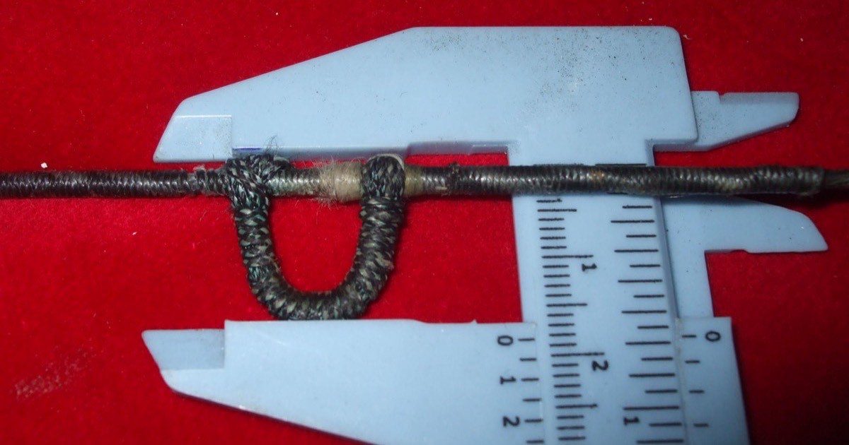 A finished D-loop on a bowstring measured with vernier calipers