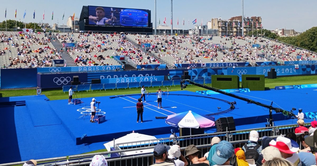 The packed Paris 2024 Olympic archery stadium at Les Invalides during the men's individual competition